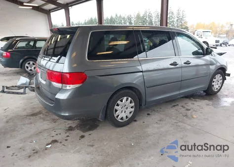 2010 Honda Odyssey Lx z USA, uszkodzony, nr VIN 5FNRL3H24AB059836